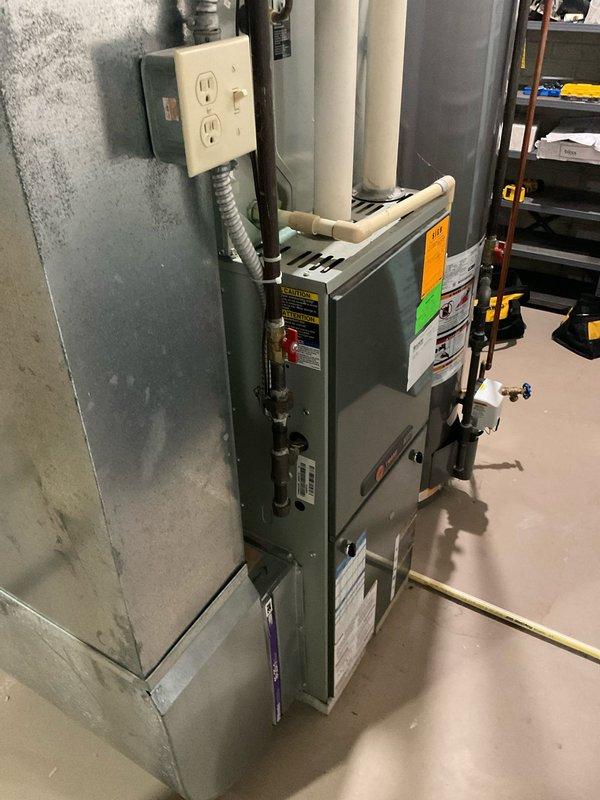 Performed comprehensive evaluation of 24-year-old Trane R-22 system experiencing low refrigerant levels. Assessed existing furnace and air conditioning equipment condition, documented current installation including ductwork connections, electrical service, and venting configuration. Provided multiple replacement options including single component and complete system upgrade estimates to address aging equipment and obsolete R-22 refrigerant concerns.