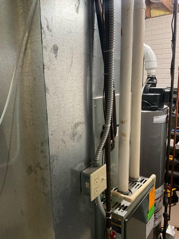 Performed comprehensive evaluation of 24-year-old Trane R-22 system experiencing low refrigerant levels. Assessed existing furnace and air conditioning equipment condition, documented current installation including ductwork connections, electrical service, and venting configuration. Provided multiple replacement options including single component and complete system upgrade estimates to address aging equipment and obsolete R-22 refrigerant concerns.