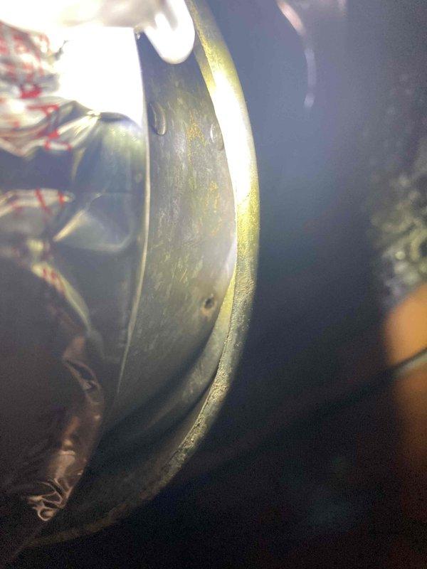 Responded to call back for air conditioning unit not turning on. Upon inspection, found condensate pump and associated drainage components within the air handler. Examined evaporator coil showing signs of dust accumulation and age-related buildup. Inspected copper refrigerant lines, electrical connections, and pump wiring for proper operation. Verified all mechanical components were properly seated and drainage system was functioning correctly to restore unit operation.