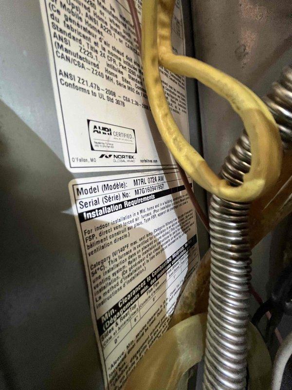 Completed scheduled AC tune-up maintenance on Nortek NTRL 072A AN system as part of prepaid membership agreement. Inspected and documented significant debris accumulation and biological growth in condensate drain pan area, cleaned drain lines and PVC connections, and verified proper drainage function. Performed standard system inspection including copper refrigerant lines, ductwork connections, and all mechanical components to ensure optimal performance for the cooling season.