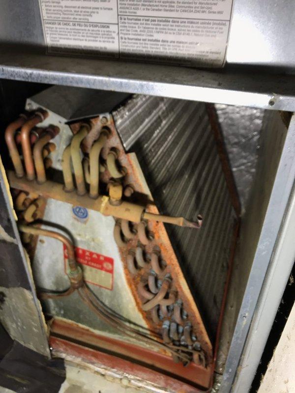 Completed preventive maintenance tune-up on residential air conditioning system. Performed comprehensive inspection of blower assembly and evaporator coil, documenting equipment condition with interior and exterior photographs. All components found operating within normal parameters; unit returned to service.
