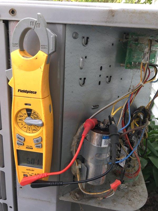 Completed preventive maintenance agreement visit on residential air conditioning system. Performed electrical diagnostics using clamp meter, verified capacitor operation and electrical connections, inspected control board and wiring terminals, and documented system condition with photos showing all major electrical components functioning within normal parameters.