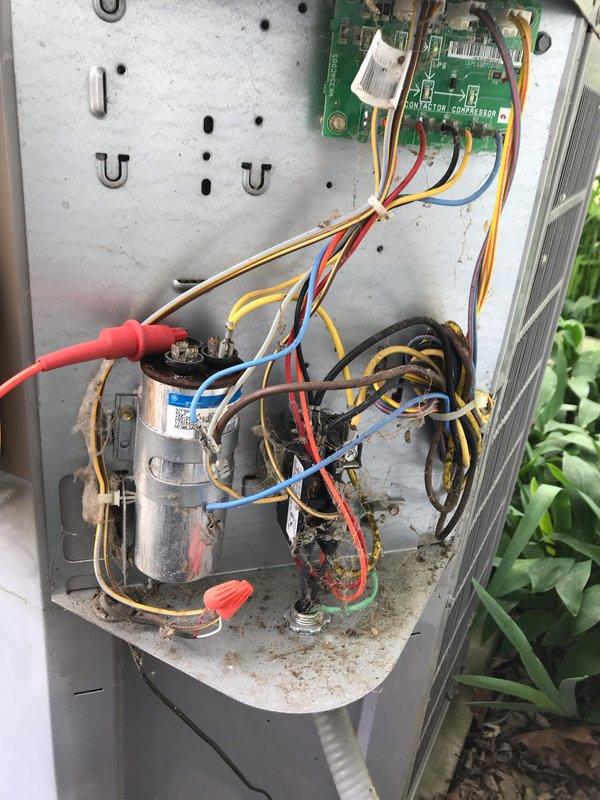 Completed preventive maintenance agreement visit on residential air conditioning system. Performed electrical diagnostics using clamp meter, verified capacitor operation and electrical connections, inspected control board and wiring terminals, and documented system condition with photos showing all major electrical components functioning within normal parameters.