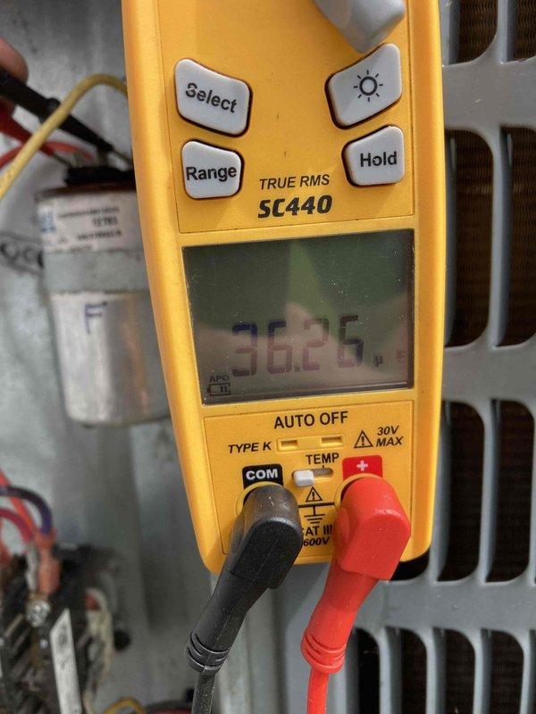 Completed routine air conditioning maintenance visit under club agreement. Performed electrical diagnostics using multimeter, recording voltage reading of 382.5V at the contactor assembly. Inspected contactor terminals, connections, and mechanical components, noting normal wear consistent with system age and operation. All electrical connections secure and system operating within specifications.
