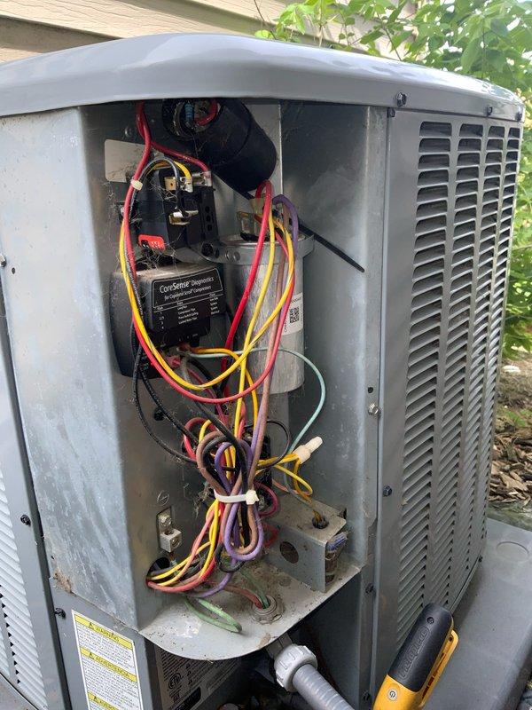 Responded to no cooling complaint on 9-year-old AC system with insufficient cooling capacity. Performed diagnostic inspection of outdoor condensing unit, accessing electrical compartment to test capacitor and verify proper electrical connections. Inspected condenser fan motor and associated components for proper operation. System evaluation revealed inadequate cooling performance with indoor temperature reaching 78 degrees despite mild 67-degree outdoor conditions.