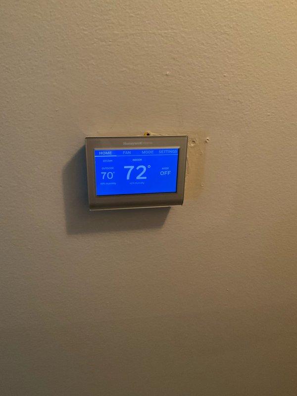 Performed diagnostic evaluation on 25-year-old air conditioning system utilizing R22 refrigerant and found system completely flat at 0 PSI, indicating total refrigerant loss. Educated property owner on R22 phase-out regulations and provided replacement estimate for air conditioning component, while noting existing Lennox high-efficiency furnace is 6 years old and in serviceable condition.