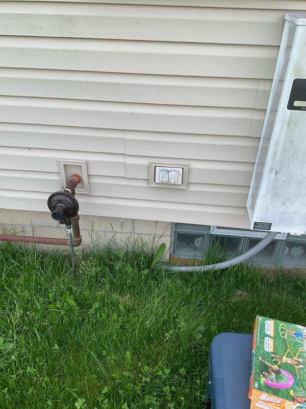 Completed comprehensive HVAC system evaluation for furnace replacement and upstairs heating/cooling options. Documented existing outdoor condensing unit showing significant rust deterioration on top surface and assessed overall system condition including electrical disconnect, refrigerant lines, and drainage components. Provided multiple equipment replacement estimates with various configuration options to address current system deficiencies and improve climate control for upper level of residence.