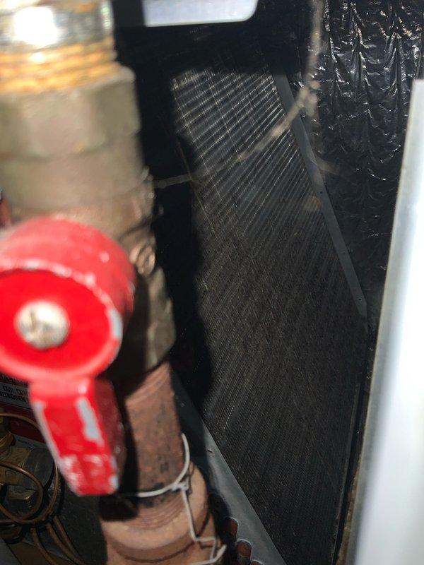 Responded to no cooling complaint on residential air conditioning unit. Upon inspection, found failed dual run capacitor preventing compressor and condenser fan motor operation. Removed defective capacitor, installed new replacement capacitor with proper microfarad ratings, verified all electrical connections secure, and tested system operation. Unit cooling properly at time of departure.