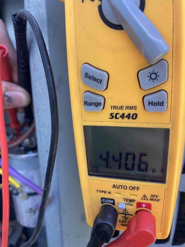 Completed routine preventive maintenance inspection on air conditioning system as part of CLUB AC 8-12 agreement. Performed electrical diagnostics using digital multimeter, recording amperage draw of 5.29A and verifying voltage readings on system components. Inspected and tested capacitor and electrical connections, confirming all measurements within manufacturer specifications for proper system operation.