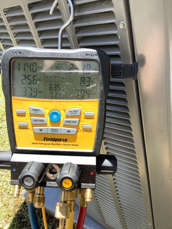 Performed preventative maintenance agreement visit on residential air conditioning system under CLUB AC10-2 plan. Conducted comprehensive system diagnostics using Fieldpiece digital manifold gauge set and clamp meter to measure electrical amperage, refrigerant pressures, and temperature readings across the outdoor condensing unit. All system parameters were verified and recorded, with readings indicating normal operating conditions. Completed standard maintenance inspection of outdoor unit components.