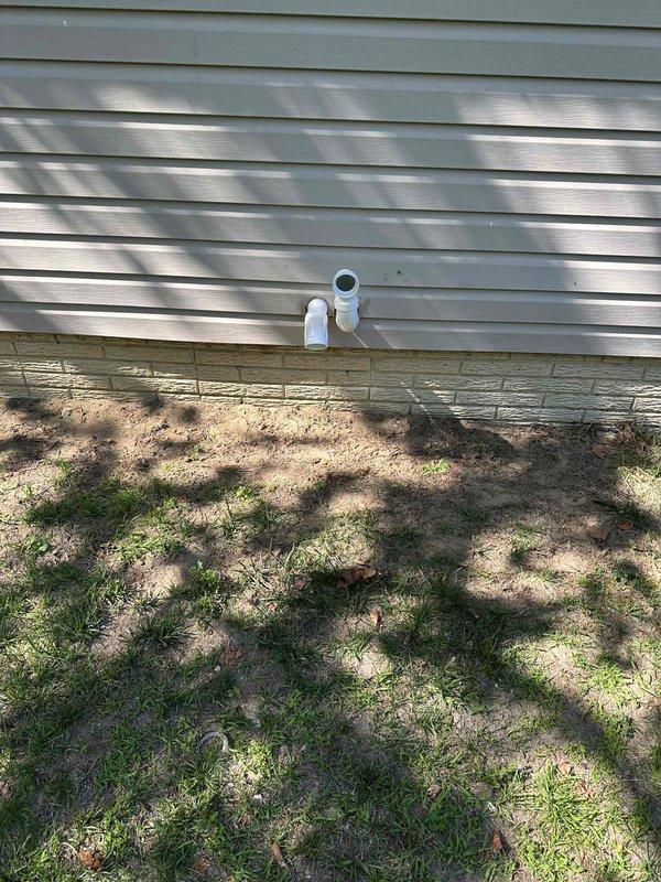 Completed full HVAC system installation including a 70,000 BTU furnace and 2-ton air conditioning unit in rear configuration. Installed all necessary PVC venting through exterior wall, connected refrigerant lines, established proper condensate drainage, and verified all gas and electrical connections. System tested and operational with all components properly secured and meeting code requirements.
