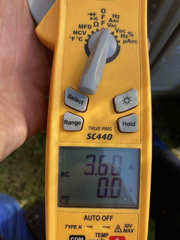 Responded to customer concern regarding loud outdoor unit noise on 1-year-old Lennox AC system. Performed comprehensive AC tune-up and system evaluation. Measured operating amperage at 360A using Fluke SC440 meter, confirming electrical parameters within normal range. Inspected condenser unit exterior panels and coil access points, noting manufacturer specifications for water-only coil cleaning on equipment label. Determined system operating sounds were within normal parameters for this model during standard cooling operation. Educated customer on typical condenser fan and compressor operational noise characteristics. System performing as designed with no mechanical deficiencies identified.