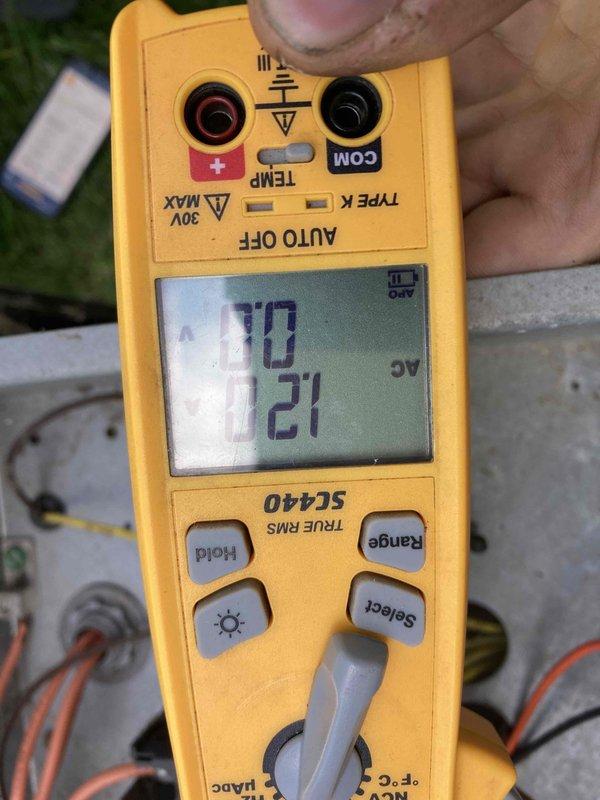 Completed prepaid AC maintenance tune-up as part of member benefits program. Performed comprehensive system inspection and diagnostics using Fieldpiece SC440 TRUE RMS multimeter to verify electrical performance, measuring voltage and amperage readings on outdoor condensing unit. All electrical parameters tested within normal operating range at 121V AC supply voltage. Conducted standard preventive maintenance procedures including visual inspection of outdoor unit components, refrigerant line assessment, and overall system operation verification. Unit operating properly with no deficiencies noted at time of service.