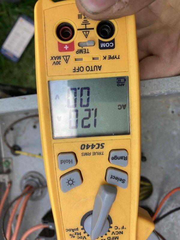 Completed prepaid AC maintenance tune-up as part of member benefits program. Performed comprehensive system inspection and diagnostics using Fieldpiece SC440 TRUE RMS multimeter to verify electrical performance, measuring voltage and amperage readings on outdoor condensing unit. All electrical parameters tested within normal operating range at 121V AC supply voltage. Conducted standard preventive maintenance procedures including visual inspection of outdoor unit components, refrigerant line assessment, and overall system operation verification. Unit operating properly with no deficiencies noted at time of service.