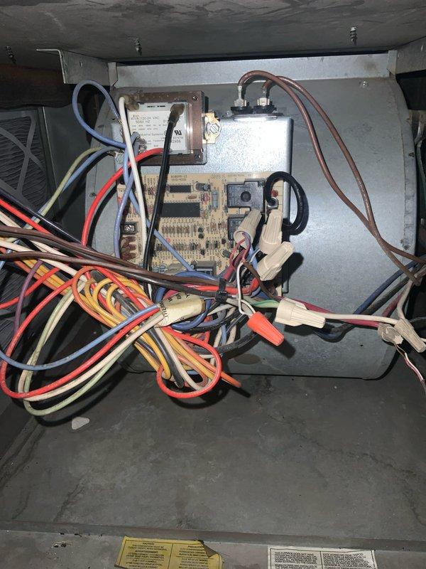 Completed routine HVAC maintenance agreement visit on split system air conditioning unit. Inspected electrical control board, transformer, and wiring connections within air handler compartment, verifying all connections were secure and components functioning properly. Evaluated and replaced heavily soiled air filter with accumulated debris on frame, restoring proper airflow to system. All equipment operating within normal parameters upon completion of service.