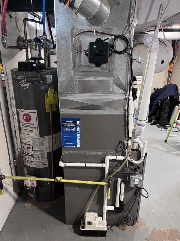Completed installation of 3-ton air conditioning system with matching evaporator coil, including all mechanical and electrical connections. Installed new digital programmable thermostat with humidity display and multi-zone control capabilities, mounted and wired air handler unit with proper ductwork connections, and reconnected all refrigerant lines to rear-discharge outdoor condensing unit. System tested and operational upon completion.