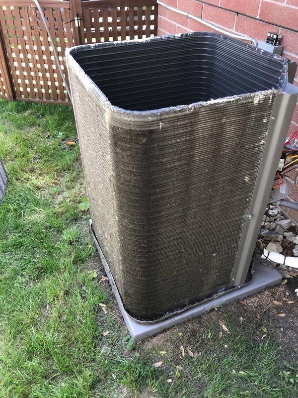 Completed prepaid air conditioning maintenance tune-up on residential split system. Performed comprehensive inspection of outdoor condenser unit, which showed significant accumulation of dirt, dust, and debris on aluminum fins and exterior surfaces. Cleaned condenser coils to restore proper heat transfer efficiency and airflow. Inspected electrical connections, refrigerant lines, and condensate drain system. Verified unit operation and documented pre-existing condition showing weathering and environmental buildup consistent with extended service without regular maintenance. All system components functioning properly upon completion of tune-up service.