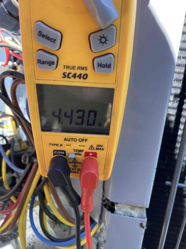 Completed Club AC12-4 air conditioning maintenance agreement visit during rescheduled service window. Performed comprehensive system diagnostics including electrical measurements using digital multimeter, verifying voltage and amperage readings to ensure proper system operation and component performance.