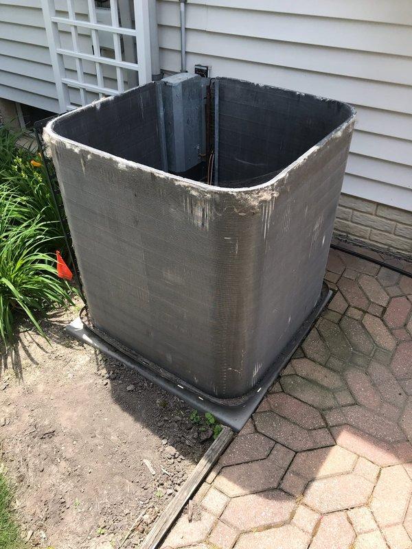 Completed comprehensive preventive maintenance inspection on residential air conditioning system under Club AC12-4 agreement. Performed thorough evaluation of outdoor condenser unit, noting weathered exterior casing with signs of environmental exposure and deterioration along top rim edges. Inspected interior components, electrical conduit connections, and verified unit positioning on base pad remains stable. Conducted attic inspection of air handler and ductwork system, examining flexible duct connections, reflective insulation integrity, and mechanical housing components. All system components operational and functioning within normal parameters at time of service visit.