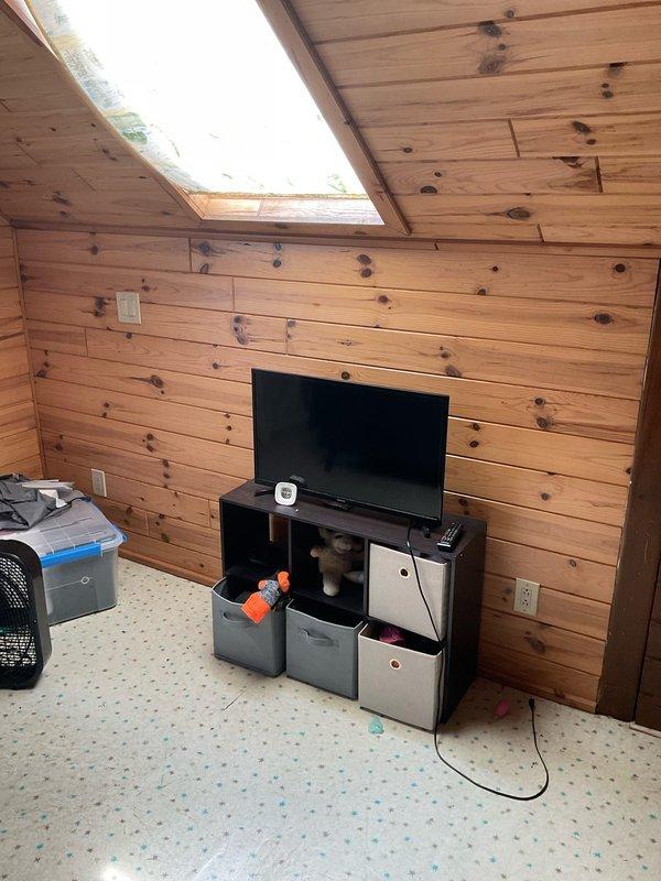 Completed estimate for mini split installation on second floor of residential property. Evaluated exterior placement for condenser unit in side yard area with existing paved access and assessed interior wood-paneled room with skylight for indoor air handler mounting. Provided recommendations for equipment sizing, placement considerations, and installation requirements for the two-zone system.