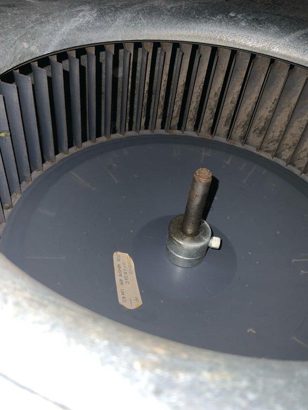 Responded to no cooling complaint on 33-year-old air conditioning system. Upon inspection, found severely corroded evaporator coil with significant oxidation, rust staining, and verdigris formation throughout copper tubing and heating elements. Condenser fan motor and blades showed heavy dust accumulation and aging. Documented extensive deterioration of internal components with photographic evidence. Given the advanced age and severe corrosion of critical components, recommended system replacement as most cost-effective solution, as repair costs would likely exceed value of aging equipment and efficiency improvements from new system would provide substantial energy savings.