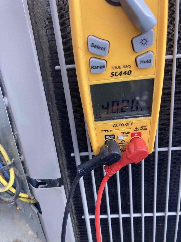# AC Not Working 8-1289

Responded to no cooling complaint on residential air conditioning system less than 10 years old. Upon arrival, performed diagnostic testing of outdoor condensing unit using digital multimeter. Measured electrical parameters and temperature readings at the condenser to identify system malfunction. Inspected condenser coil condition through protective grille, which appeared normal with no visible blockage or damage. Verified power supply at disconnect box. Conducted voltage and capacitance measurements to isolate the cooling failure. System evaluated and measurements documented for repair recommendations.