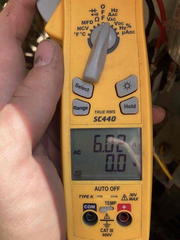Completed Club AC10-2 preventive maintenance agreement visit on air conditioning system. Performed electrical diagnostics using digital multimeter, recording voltage readings of 6.02 AC volts at tested components. Conducted internal ductwork inspection using borescope camera to assess condition of corrugated metal duct sections, confirming integrity of ductwork with no visible damage or deterioration noted.