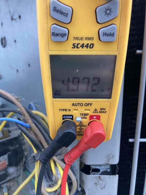 Completed annual preventive maintenance tune-up on 8-year-old air conditioning system per service agreement. Performed comprehensive system inspection including electrical testing with multimeter to verify proper voltage and amperage readings, confirming all components operating within manufacturer specifications. No deficiencies identified; system found in good working condition with no repairs required.