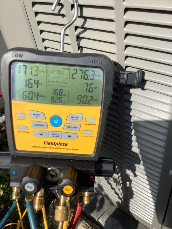 # HVAC Service Completed

Responded to service call for outdoor condensing unit with non-operational condenser fan motor and audible clicking from contactor. Upon arrival, confirmed condenser fan motor was not spinning while compressor was attempting to start. Performed electrical diagnostics using digital multimeter to test voltage supply and component functionality. Measured system pressures and temperatures using refrigerant manifold gauge set to assess overall system operation and refrigerant charge levels.

Testing revealed faulty fan motor requiring replacement. Verified proper voltage at disconnect and contactor terminals. Inspected electrical connections at outdoor unit control panel and confirmed wiring integrity. System diagnostics showed abnormal pressure readings consistent with non-operational condenser fan condition. Replaced defective condenser fan motor with OEM equivalent unit. Verified proper motor rotation direction and secured all electrical connections. Tested capa