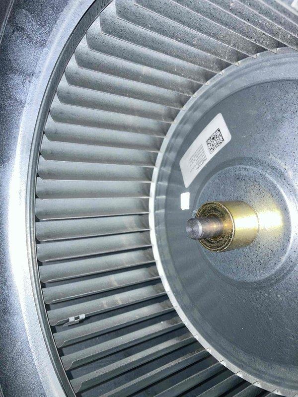 Completed routine air conditioning tune-up and preventative maintenance on residential AC system. Performed comprehensive inspection of outdoor condenser unit and indoor blower assembly, noting dust accumulation on blower wheel and housing. Cleaned and serviced all accessible components, checked refrigerant lines and connections, verified proper airflow through louvered panels, and ensured system operational readiness for cooling season.