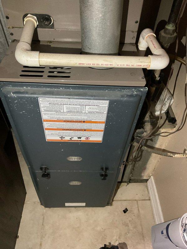 Conducted comprehensive site assessment for HVAC system replacement in residential mechanical room. Evaluated existing furnace unit with metallic ductwork configuration, PVC condensate drainage system, and associated utility connections to provide accurate equipment replacement estimate and system upgrade recommendations.