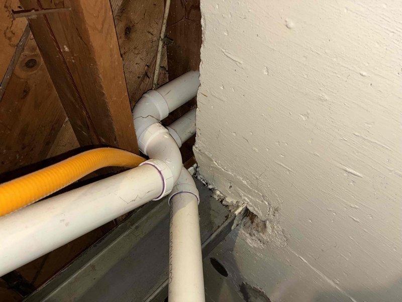 Conducted on-site assessment of residential HVAC system in basement area for single component replacement estimate. Evaluated existing ductwork configuration, clearances, and accessibility constraints within cluttered storage space featuring exposed ceiling joists and metal duct runs. Documented current system conditions and structural considerations including exposed wall framing, PVC plumbing lines, and concrete flooring that will impact equipment installation and replacement procedures.