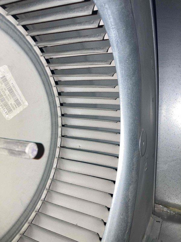 Completed Club AC8-12 preventive maintenance agreement visit on air conditioning system. Performed comprehensive system inspection including electrical testing with multimeter to verify proper voltage and amperage readings, which measured at 5.5 on the digital display. Inspected blower assembly and squirrel cage fan wheel, confirming all blades were intact and properly secured to motor housing. Unit operating within normal parameters with no deficiencies noted at time of service.