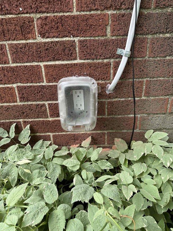 Responded to callback for exterior GFCI outlet that had pulled away from brick structure. Upon arrival, found weathered electrical box with compromised mounting and deteriorated brick material around cable entry point. Secured outlet box to wall structure, verified GFCI functionality, and confirmed weatherproof cover was properly sealed and operational.