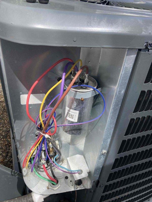 Completed preventive maintenance agreement visit for Club AC12-4 service on air conditioning system. Performed comprehensive inspection of all accessible components including blower assembly and electrical connections. Blower wheel showed moderate accumulation of dust and debris on fan blades, which is typical for units in regular operation. Inspected capacitor, compressor connections, and associated wiring harnesses. All electrical connections were secure with proper color-coded wiring intact. Documented system condition through photographic records showing interior components and blower assembly. Unit operational at time of service with no immediate repairs required.