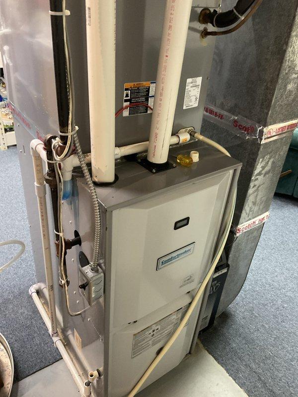 Provided comprehensive estimate for complete HVAC system replacement including AC unit and furnace for 15-year-old equipment experiencing refrigerant loss requiring repeated R-410A additions. Evaluated existing side yard condenser unit and indoor air handler/furnace system operating on natural gas, assessed ductwork connections, venting configuration, and electrical requirements for new equipment installation in utility room location.