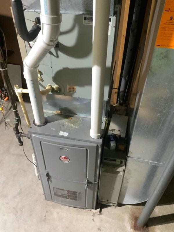 Responded to no cooling complaint on residential air conditioning system. Upon arrival, confirmed compressor was operating but system was not producing cool air. Diagnosed failed compressor with internal mechanical failure preventing proper refrigerant compression despite electrical operation. Replaced compressor unit and associated components. Evacuated system, pressure tested for leaks, and recharged with proper refrigerant type and quantity per manufacturer specifications. Verified all electrical connections, tested capacitor and contactor operation. System restored to proper cooling operation with normal temperature differential across evaporator coil. All safety controls tested and functioning properly.