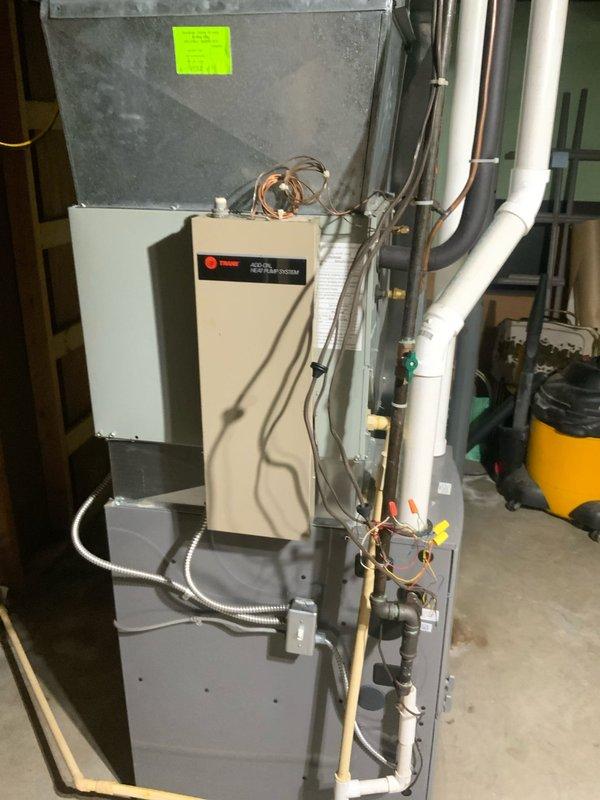 Responded to no cooling complaint on residential air conditioning system. Upon arrival, confirmed compressor was operating but system was not producing cool air. Diagnosed failed compressor with internal mechanical failure preventing proper refrigerant compression despite electrical operation. Replaced compressor unit and associated components. Evacuated system, pressure tested for leaks, and recharged with proper refrigerant type and quantity per manufacturer specifications. Verified all electrical connections, tested capacitor and contactor operation. System restored to proper cooling operation with normal temperature differential across evaporator coil. All safety controls tested and functioning properly.