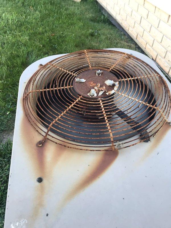 # HVAC Service Completion Summary

Responded to no cooling complaint on 10+ year old outdoor condensing unit. Upon arrival, performed comprehensive diagnostic evaluation of system between 2-6pm. Visual inspection revealed severely deteriorated condenser unit with extensive rust and corrosion on fan guard assembly and exterior casing. Examined electrical components including capacitor and contactor mounted on unit exterior. 

Conducted electrical testing and system analysis to identify root cause of cooling failure. Verified capacitor values, tested contactor operation, and checked all electrical connections. Multiple colored wiring connections showed signs of environmental exposure but maintained secure terminations. Component testing confirmed system operational status after diagnostic procedures.

Applied reality check inspection label to document testing completion and verification dates. Unit exhibited significant weathering consistent with age and outdoor exposure, including rust 
