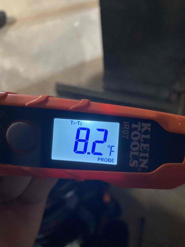 Responded to no cooling complaint on aging unit. Performed diagnostic assessment revealing significant temperature differential issues, with supply air measuring 8.2°C indicating compromised system performance. Upon inspection, discovered extensive corrosion and deterioration throughout interior components, including heavy rust on structural supports and evidence of long-term moisture exposure affecting critical mechanical assemblies.