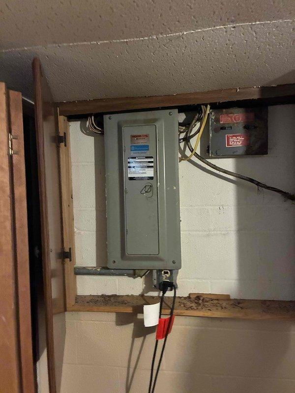 Completed on-site assessment for HVAC system replacement estimate. Documented existing electrical infrastructure including main service panel and associated components in basement utility area. Photographed electrical panel configuration, circuit breaker arrangement, and available power supply to determine compatibility and requirements for new HVAC equipment installation. Evaluated electrical capacity and wiring conditions to ensure proper sizing and safe integration of replacement heating and cooling system.