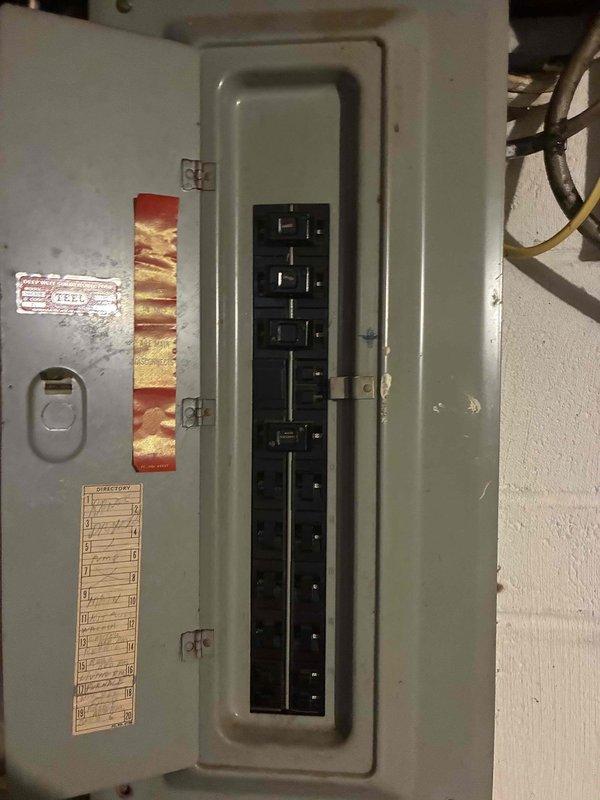 Completed on-site assessment for HVAC system replacement estimate. Documented existing electrical infrastructure including main service panel and associated components in basement utility area. Photographed electrical panel configuration, circuit breaker arrangement, and available power supply to determine compatibility and requirements for new HVAC equipment installation. Evaluated electrical capacity and wiring conditions to ensure proper sizing and safe integration of replacement heating and cooling system.