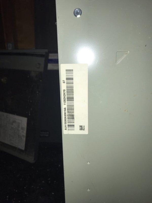 Responded to no-cool complaint on 20-year-old central air conditioning system with reported weak airflow and suspected refrigerant loss or compressor failure. Upon inspection, accessed control board and electrical components to diagnose system operation. Evaluated blower motor performance, checked compressor functionality, and assessed overall system condition. Documented equipment age and operational status with photos of control panel assembly and unit identification for service records.