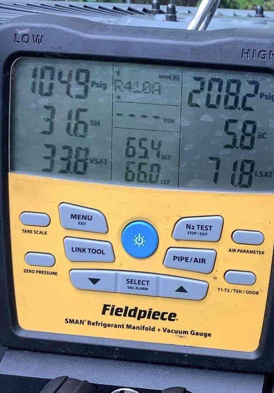 Completed preventative maintenance agreement visit on attic-mounted air conditioning system. Performed comprehensive system diagnostics using digital manifold gauges, measuring refrigerant pressures and temperatures for R410A system. Verified proper refrigerant charge levels using calibrated refrigerant scale, with all superheat and subcooling readings within manufacturer specifications.