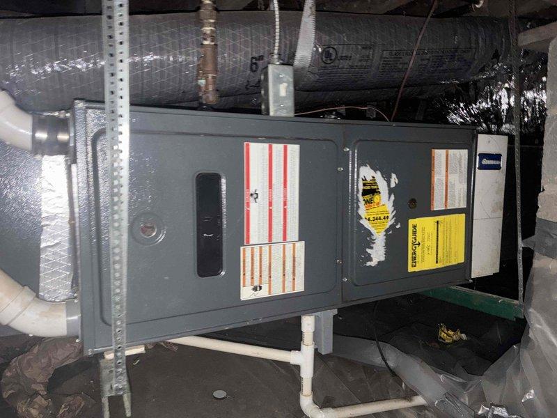 Completed comprehensive estimate for complete HVAC system replacement at residential property. Assessed existing attic-mounted air handler unit and associated ductwork infrastructure to determine replacement specifications. Documented current system configuration including air handler placement in confined attic space, existing flexible and rigid ductwork routing, condensate drain line installation, and support bracket positioning. Photographed equipment nameplate data, unit condition, and surrounding mechanical space to provide accurate replacement sizing and equipment selection. Revised previous estimate based on updated requirements and prepared financing options for customer consideration. System evaluation confirmed need for new equipment installation with proper ductwork integration and code-compliant installation in existing attic mechanical space.