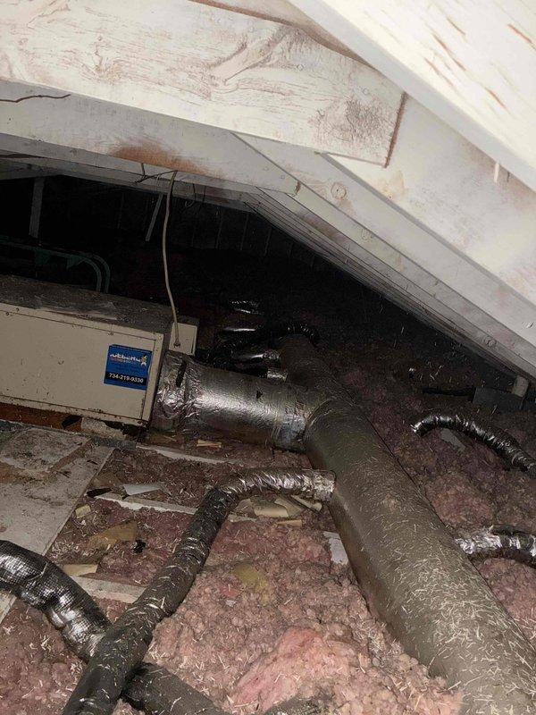 Conducted on-site assessment for complete attic air handler and outdoor condenser replacement. Evaluated existing Honeywell thermostat operation and inspected attic installation including current ductwork configuration, insulation conditions, and electrical connections. Documented existing HVAC system layout with attention to flexible duct routing and mounting locations to prepare comprehensive replacement estimate for new equipment installation.