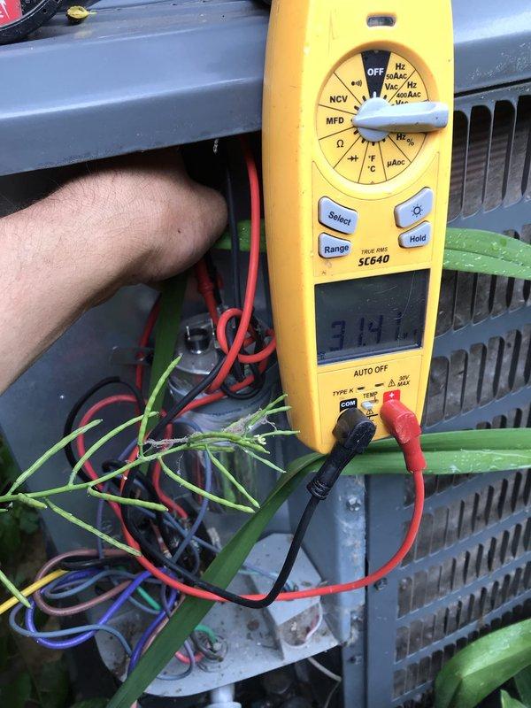 Responded to no cooling call with outdoor fan not operating. Upon inspection, diagnosed failed contactor preventing compressor and condenser fan operation. Measured voltage at contactor coil using digital multimeter, confirmed coil energizing but contacts not closing. Replaced defective contactor, verified proper voltage at all terminals, and tested system operation. Unit restored to normal cooling function with compressor and outdoor fan running properly.