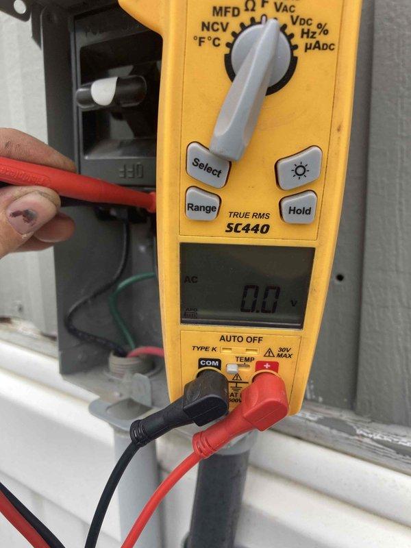 # AC Repair - No Cool Condition

Responded to service call for air conditioning system blowing warm air. Upon arrival, performed diagnostic testing using digital multimeter to check electrical components and verify proper voltage and capacitance readings. Identified faulty component within the control circuit affecting system operation.

Accessed electrical control panel and performed necessary wiring repairs, utilizing proper wire connectors to ensure secure connections. Replaced defective component with red, yellow, and blue wire leads, ensuring all connections met manufacturer specifications and electrical code requirements. Verified all wire terminations were tight and properly secured within the control panel enclosure.

Completed electrical testing to confirm proper system operation and restored cooling function. System operating normally upon departure.