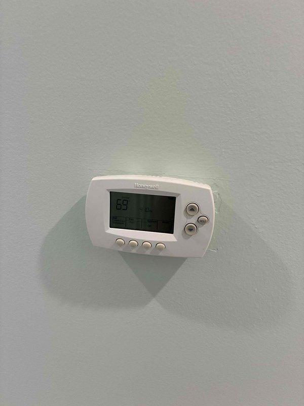 Provided estimate for complete HVAC system replacement to address existing air conditioning unit experiencing freeze-up issues after two hours of operation. Current equipment is over 20 years old and located in basement alongside natural gas furnace, requiring evaluation for full system upgrade to restore proper cooling performance and improve overall efficiency.