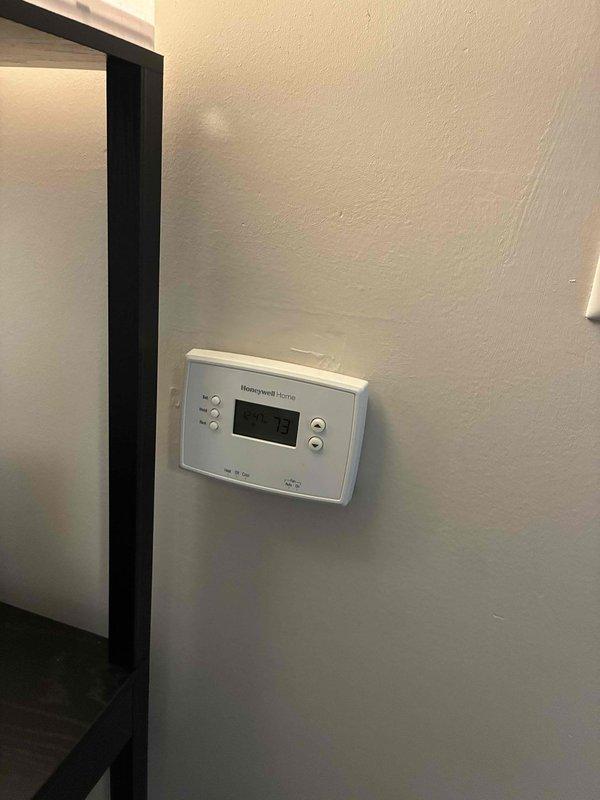 Conducted on-site evaluation for air conditioning system replacement at residential property. Assessed existing electrical panel capacity and circuit availability, documented current thermostat configuration with Honeywell Home digital unit, and evaluated installation requirements for new AC system where no cooling equipment currently exists. Prepared comprehensive replacement estimate including equipment specifications, electrical requirements, and installation scope for complete air conditioning system installation.